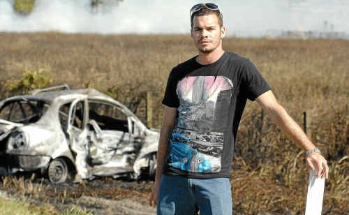 Maclean man Jack Purcell put his own life at risk to drag a woman from a burning car north of the Harwood Bridge on the Pacific Highway on Saturday. Maclean man Jack Purcell put his own life at risk to drag a woman from a burning car north of the Harwood Bridge on the Pacific Highway on Saturday.