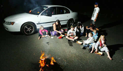Sue-Anne Holland and her eight children spend the night in a Brassall park. Sue-Anne Holland and her eight children spend the night in a Brassall park.