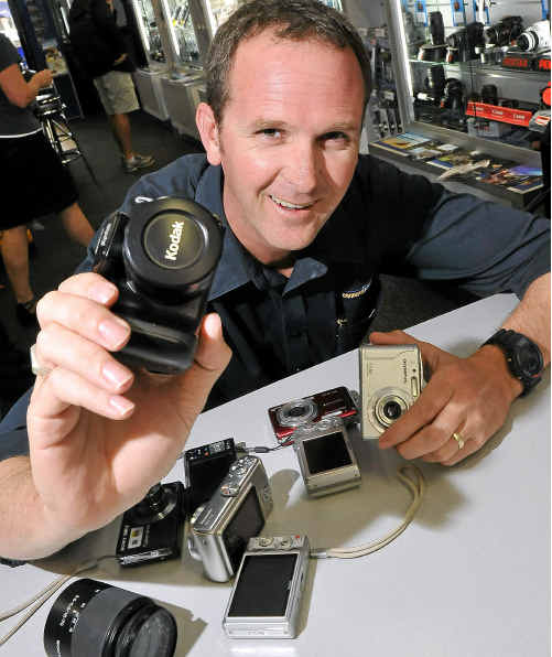 Bundaberg Camera House’s Scott Allison with old camera equipment that will be recycled into things like park benches instead of going to landfill. Bundaberg Camera House’s Scott Allison with old camera equipment that will be recycled into things like park benches instead of going to landfill.