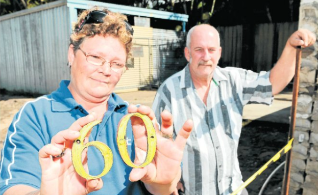 Sherry and Dave Leigh claim they have been delayed in trying to rebuild their lives after the Christmas floods by a barricade of bureaucratic red tape. Sherry and Dave Leigh claim they have been delayed in trying to rebuild their lives after the Christmas floods by a barricade of bureaucratic red tape.