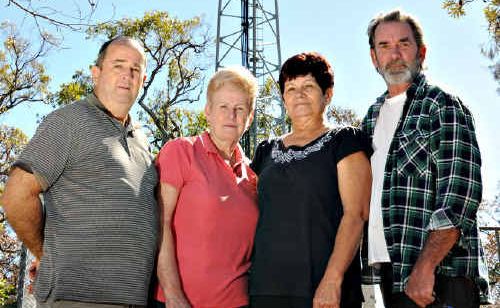 Cooloola Cove residents Wayne and Jane Lidster, Anna Malovan and Kevin Pilcher say the 21st Century has left them in the dark ages.