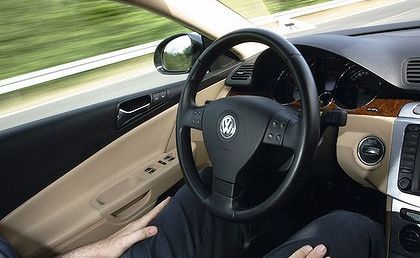 Look ma, no hands ... Volkswagen's Temporary Auto Pilot in operation. Look ma, no hands ... Volkswagen's Temporary Auto Pilot in operation.