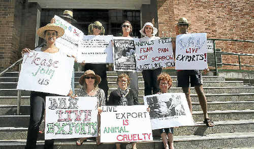 Activists call for a new ban on the export of live cattle from Australia during a protest outside Rockhampton City Hall yesterday. Activists call for a new ban on the export of live cattle from Australia during a protest outside Rockhampton City Hall yesterday.