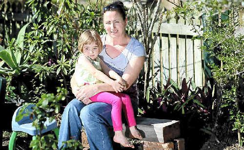 Susan and Isabella Hiley relax in their favourite part of their garden that backs on to the Berserker Ranges. Susan and Isabella Hiley relax in their favourite part of their garden that backs on to the Berserker Ranges.