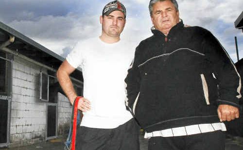 Ballina horse trainer Danny Bowen with his son Daniel and horse Pushroad. Mr Bowen says the latest horse death from hendra is “so close to home”. Ballina horse trainer Danny Bowen with his son Daniel and horse Pushroad. Mr Bowen says the latest horse death from hendra is “so close to home”.