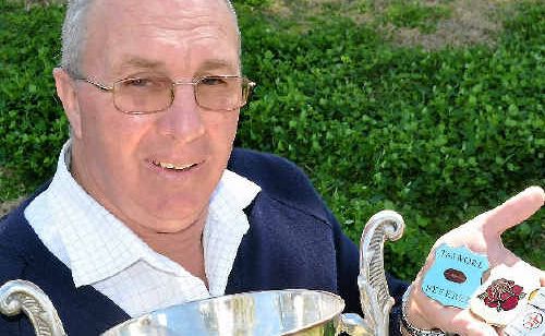 Dragons visit event co-ordinator Glen Whitton with the St George Cup and some of the referee’s badges from the 1950s of Trevor Mulcahy. Dragons visit event co-ordinator Glen Whitton with the St George Cup and some of the referee’s badges from the 1950s of Trevor Mulcahy.