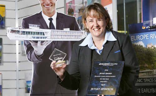 Ipswich Manager Sharon Jones shows off awards won at the Jetset awards night. Ipswich Manager Sharon Jones shows off awards won at the Jetset awards night.
