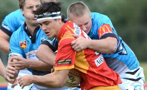 Hardworking Comets lock Maddison Williams is hit by the Sharks defence. 