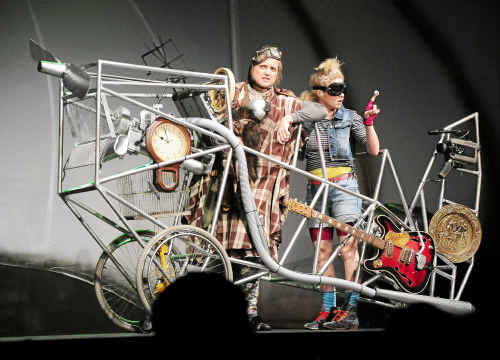 Aunt Olympia (Sandra Eldridge) and Emily Eyefinger (Dannielle Jackson) go flying on stage at the Jetty Memorial Theatre. Aunt Olympia (Sandra Eldridge) and Emily Eyefinger (Dannielle Jackson) go flying on stage at the Jetty Memorial Theatre.