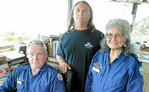 BAR DANGER: Owen and Andrea Danvers from Marine Rescue Brunswick with Rod Gray from Blue Bay Divers at the Brunswick Valley Marine Rescue tower. BAR DANGER: Owen and Andrea Danvers from Marine Rescue Brunswick with Rod Gray from Blue Bay Divers at the Brunswick Valley Marine Rescue tower.
