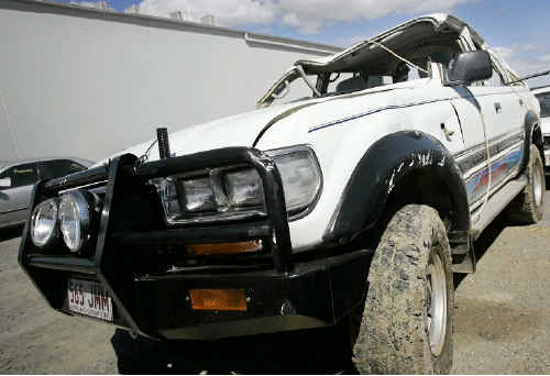 Fire crews cut the roof off this vehicle after it left the road and landed in Pumpkin Creek.