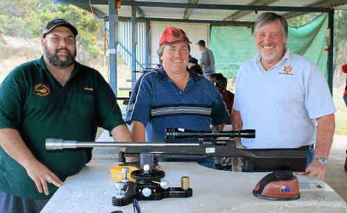 Winner Damien Webb, SSAA Warwick president Mal Smith and winner Russell Powell at the state championships at Risdon Range. Winner Damien Webb, SSAA Warwick president Mal Smith and winner Russell Powell at the state championships at Risdon Range.
