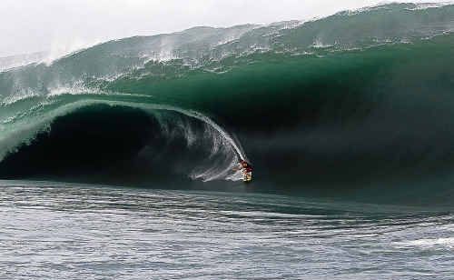 DEATH DEFYING: No wild card, but Bruce Irons – brother of late world champion and Teahupoo title holder Andy – pulls into one of the biggest monsters of the Billabong Pro in Tahiti. DEATH DEFYING: No wild card, but Bruce Irons – brother of late world champion and Teahupoo title holder Andy – pulls into one of the biggest monsters of the Billabong Pro in Tahiti.