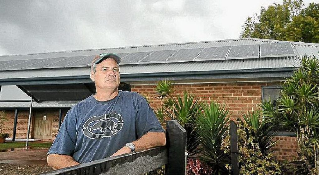 Tony Weir, of Brushgrove, with the 16 solar panels which cost him more than $17,000 to install. Tony Weir, of Brushgrove, with the 16 solar panels which cost him more than $17,000 to install.