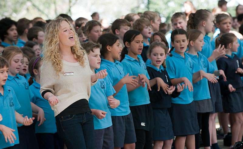 Schools from the Toormina/Sawtell area gather to sing We’ve Got the Music with special guest Shekinah Moye who wrote last year’s song.
Schools from the Toormina/Sawtell area gather to sing We’ve Got the Music with special guest Shekinah Moye who wrote last year’s song.