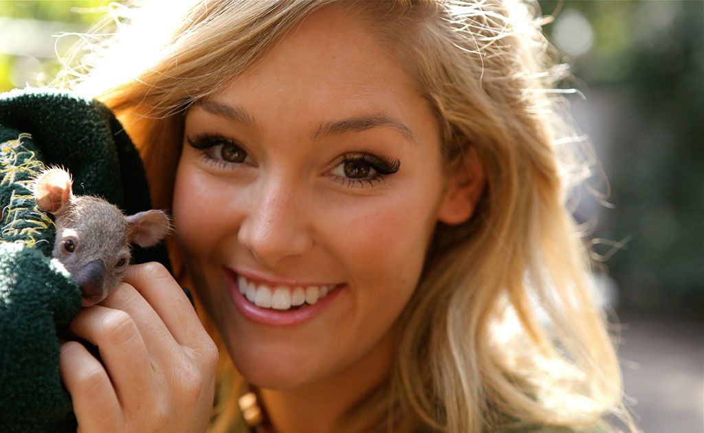 Erin McNaught poses with baby koala Allira at Featherdale Wildlife Park in Sydney.
Erin McNaught poses with baby koala Allira at Featherdale Wildlife Park in Sydney.