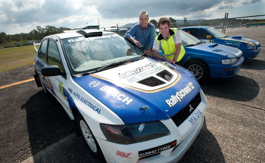 Rally Australia's Paul Woodward and Ben Raggatt inspect the first rally cars to hit town. Rally Australia's Paul Woodward and Ben Raggatt inspect the first rally cars to hit town.
