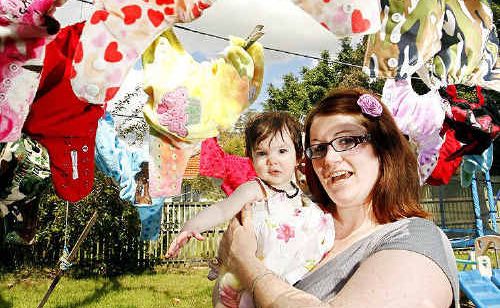 Mother of three Samantha Smith prefers to use cloth nappies. Samantha believes they are better value than disposable nappies and are not as damaging to the environment which her baby daughter Kiara Mulligan (photographed here) will inherit. Mother of three Samantha Smith prefers to use cloth nappies. Samantha believes they are better value than disposable nappies and are not as damaging to the environment which her baby daughter Kiara Mulligan (photographed here) will inherit.