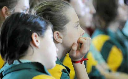 Students listen to Denise and Bruce Morcombe at Chanel College, Gladstone, yesterday. Students listen to Denise and Bruce Morcombe at Chanel College, Gladstone, yesterday.