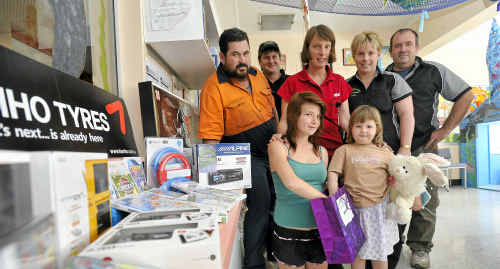(Front) Caitlan Taylor, 14, and Amali Rainbow, 4, draw the raffle as (back) Malcolm McLennan of All Round Tyres, Rod Purnell of Purnell Performance, nursing unit manager of Grafton Base Hospital children’s ward Lissa Morgan, and Shelley Brophy and Tom Schipp of Grafton Auto Electrics with goods to be donated to the children’s ward. (Front) Caitlan Taylor, 14, and Amali Rainbow, 4, draw the raffle as (back) Malcolm McLennan of All Round Tyres, Rod Purnell of Purnell Performance, nursing unit manager of Grafton Base Hospital children’s ward Lissa Morgan, and Shelley Brophy and Tom Schipp of Grafton Auto Electrics with goods to be donated to the children’s ward.