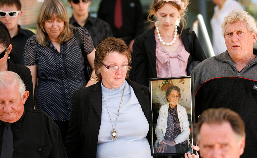 Iris Temperley’s daughter, Kerry Bickle, holds a photograph of her mother, who was murdered on Australia Day last year, outside the court. Iris Temperley’s daughter, Kerry Bickle, holds a photograph of her mother, who was murdered on Australia Day last year, outside the court.