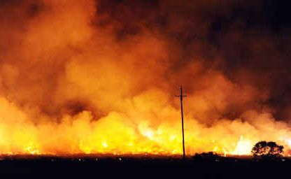 Sugar cane burns west of Maryborough amid fears profits from the crush will suffer the same fate. Sugar cane burns west of Maryborough amid fears profits from the crush will suffer the same fate.