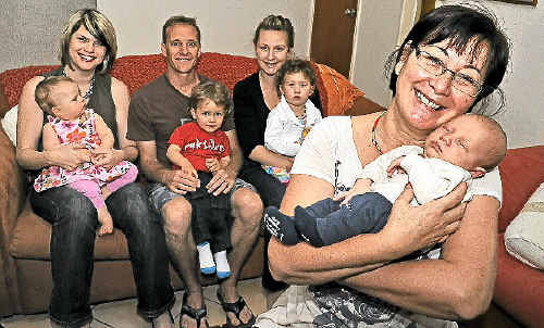 NEW EXPERIENCE: Hypno-birthing therapist Marilyn Colvin Boon holds three-week-old Kai Campbell, with (from left) Alana Hodgins and daughter Sienna White, 12 months, David Wallace with son Elijah, 17 months, and mother of Kai, Kahlia Leggett with her daughter Bella Campbell, 2. NEW EXPERIENCE: Hypno-birthing therapist Marilyn Colvin Boon holds three-week-old Kai Campbell, with (from left) Alana Hodgins and daughter Sienna White, 12 months, David Wallace with son Elijah, 17 months, and mother of Kai, Kahlia Leggett with her daughter Bella Campbell, 2.
