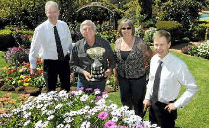 Grand Champion garden winners Arch and Julie Roggeveen are presented with their trophy by Heritage Building Society CEO John Minz (left) and The Chronicle general manager Rohan Gosstray. Grand Champion garden winners Arch and Julie Roggeveen are presented with their trophy by Heritage Building Society CEO John Minz (left) and The Chronicle general manager Rohan Gosstray.
