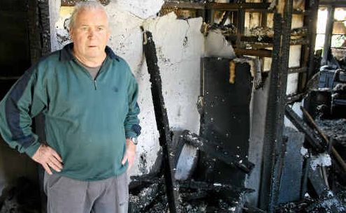 LUCKY ESCAPE: John Nyari (above) was lucky to escape his home last week after it was engulfed by flames. It is now completely gutted, with John having to live in his shed until his insurance comes through. LUCKY ESCAPE: John Nyari (above) was lucky to escape his home last week after it was engulfed by flames. It is now completely gutted, with John having to live in his shed until his insurance comes through.