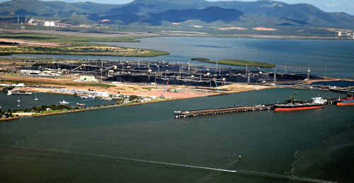 Aerial photography of Gladstone region taken February 27th, 2011: Coal stacks and Mt Larcom. Aerial photography of Gladstone region taken February 27th, 2011: Coal stacks and Mt Larcom.