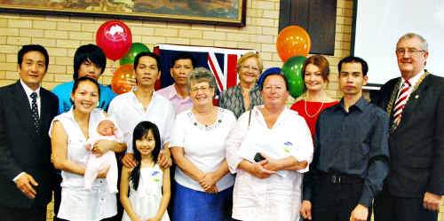 Peter, Miiti, Kathy (baby) and Khan Nggyen,Sue Bird, Lucille Burt, Duc Lo, Mayor Ron Dyne. Back: Huy and Lu Ngo, Quat Quang, Simonetta Tondinelli, Nur Harm. Peter, Miiti, Kathy (baby) and Khan Nggyen,Sue Bird, Lucille Burt, Duc Lo, Mayor Ron Dyne. Back: Huy and Lu Ngo, Quat Quang, Simonetta Tondinelli, Nur Harm.