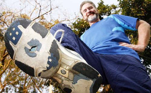 Ashley Saunders shows the worn-out underside of his running shoe. He lost 28kgs by dieting and walking up to 20kms a day. Ashley Saunders shows the worn-out underside of his running shoe. He lost 28kgs by dieting and walking up to 20kms a day.