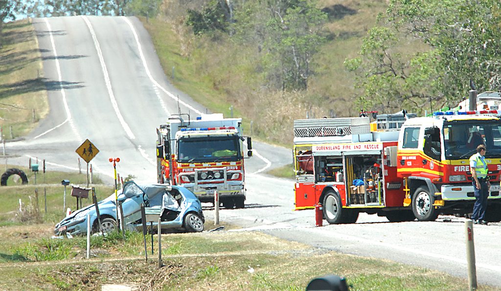 A woman is dead and a teenager has been flown to Townsville Hospital after a two-vehicle crash near Walkerston. A woman is dead and a teenager has been flown to Townsville Hospital after a two-vehicle crash near Walkerston.