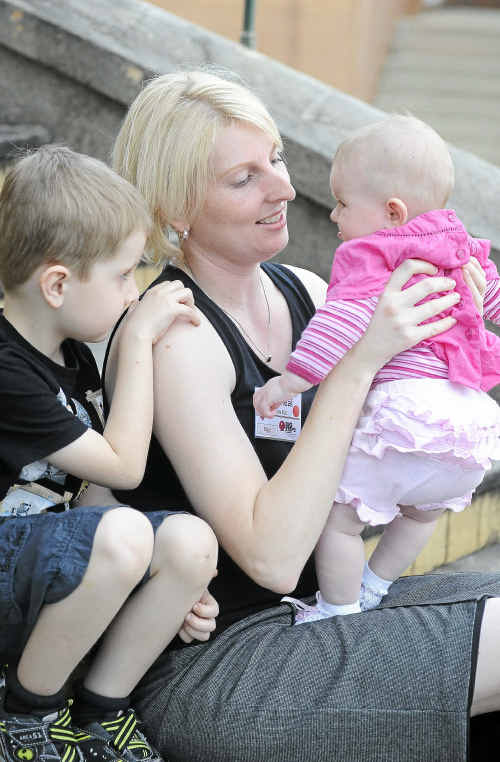 Childcare worker Lisa Cheal with Zac Pitt, 5, and Mia Mackay, 5 months, gathered with other workers to debate the industry crisis. Childcare worker Lisa Cheal with Zac Pitt, 5, and Mia Mackay, 5 months, gathered with other workers to debate the industry crisis.
