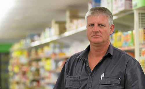 Colin Davis, owner of Foodworks Tancred on Gladstone Rd, is not impressed that his store was held up on Sunday night. Colin Davis, owner of Foodworks Tancred on Gladstone Rd, is not impressed that his store was held up on Sunday night.