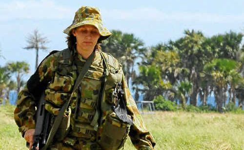 LAC/W Vanessa Wallace from 382 ECSS with her dog Akyra on a patrol at Dili International Airport. The commanding officer of the Lismore-based 41st Battalion of the Royal NSW Regiment, Lieutenant Colonel Graham Ruhle, says we’re about to find out if the Australian public is ready for women to take up combat roles. AAP IMAGE. LAC/W Vanessa Wallace from 382 ECSS with her dog Akyra on a patrol at Dili International Airport. The commanding officer of the Lismore-based 41st Battalion of the Royal NSW Regiment, Lieutenant Colonel Graham Ruhle, says we’re about to find out if the Australian public is ready for women to take up combat roles. AAP IMAGE.