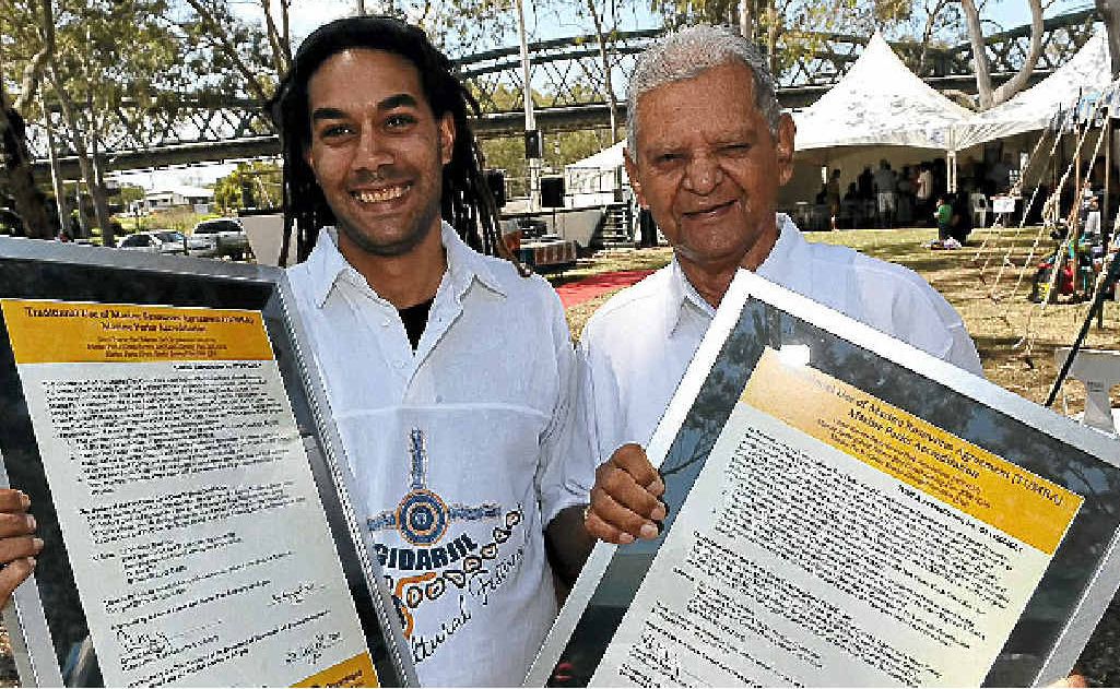 Byellee clan member Michael Cook and Gooreng Gooreng clan member Colin Johnson receive accreditation from Tumra for their outstanding care of the marine environment at the Gidarjil Cultural Fest at Lions Park. Byellee clan member Michael Cook and Gooreng Gooreng clan member Colin Johnson receive accreditation from Tumra for their outstanding care of the marine environment at the Gidarjil Cultural Fest at Lions Park.
