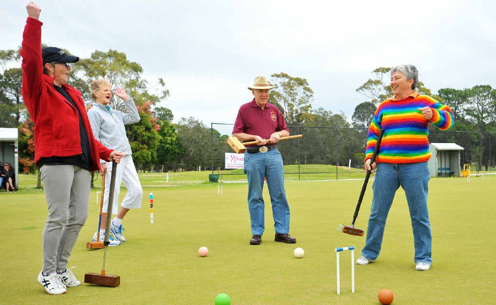 Maree Ennis (right) is congratulated after her fine play at the croquet day.