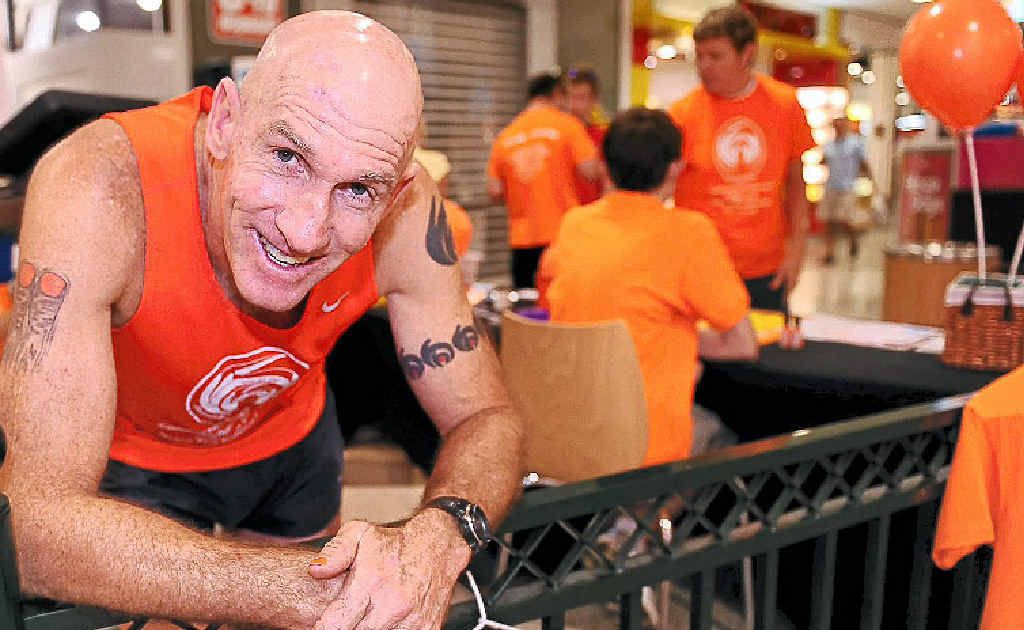 Garry Lawton takes a quick break from running for Orange Thumbs Inc at Hinkler Central to help raise funds and awareness for brain tumour research. Garry Lawton takes a quick break from running for Orange Thumbs Inc at Hinkler Central to help raise funds and awareness for brain tumour research.