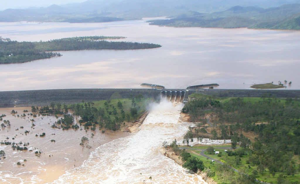 Water pours from the Wivenhoe Dam spillway in mid-January this year. Water pours from the Wivenhoe Dam spillway in mid-January this year.
