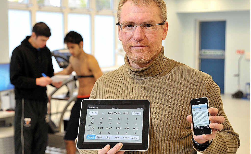 Former Maryborough soccer player Dr Grant Abt with the iPad application he’s developed for English Premier League club Liverpool. Former Maryborough soccer player Dr Grant Abt with the iPad application he’s developed for English Premier League club Liverpool.