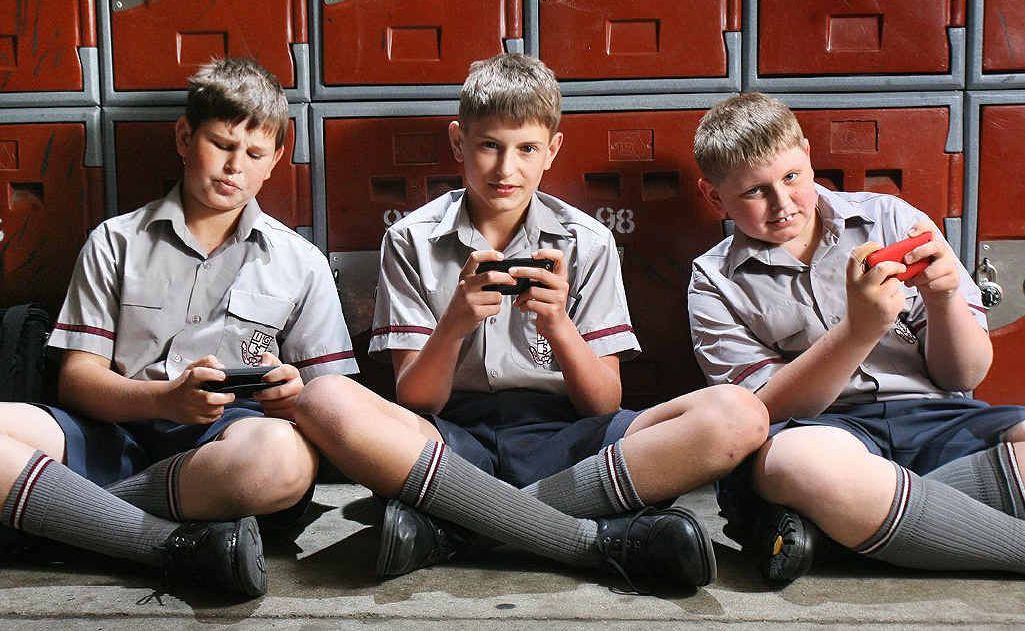 Ipswich Grammar School students Luke Cronan, Robert Harman-Schufft and Spencer Zanner say texting doesn’t affect their schoolwork. Ipswich Grammar School students Luke Cronan, Robert Harman-Schufft and Spencer Zanner say texting doesn’t affect their schoolwork.