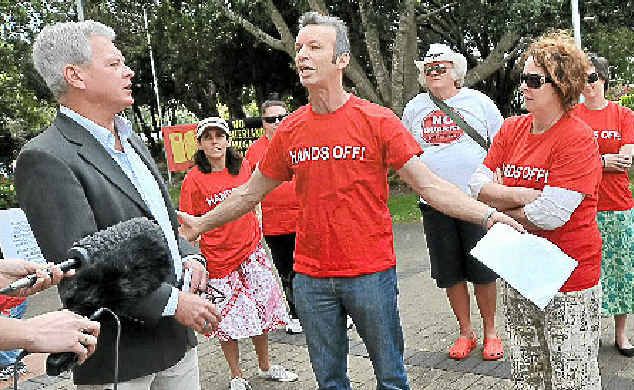 Kin Kin Community Group members bail up Cr Lew Brennan outside the Caloundra Council Chambers. Kin Kin Community Group members bail up Cr Lew Brennan outside the Caloundra Council Chambers.