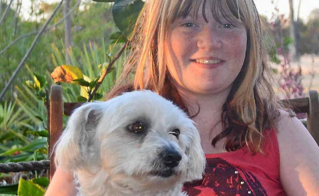 Stacie Mulligan and Sophie the super spaniel, back home after she went missing from her family’s Chinchilla property 10 months ago. Stacie Mulligan and Sophie the super spaniel, back home after she went missing from her family’s Chinchilla property 10 months ago.
