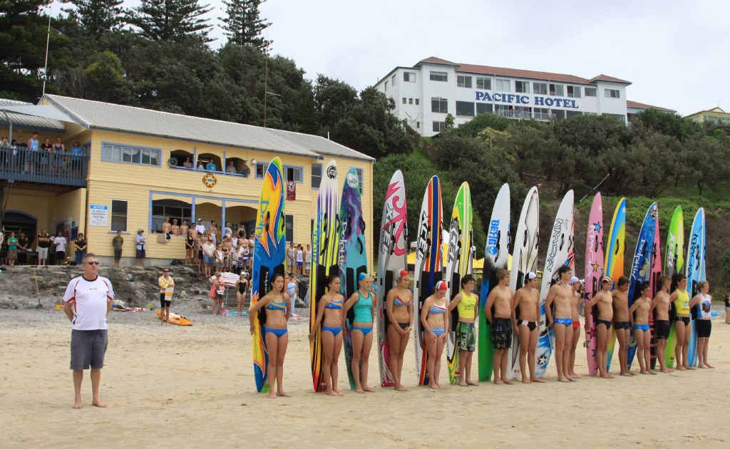 Competitors in the Dash for Cash event line up and face the ocean prior to the start of the race and hold a minute’s silence in memory of Jacob Lollback. Competitors in the Dash for Cash event line up and face the ocean prior to the start of the race and hold a minute’s silence in memory of Jacob Lollback.