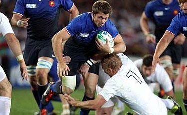France's Vincent Clerc is toppled at Eden Park. France's Vincent Clerc is toppled at Eden Park.
