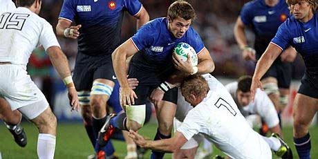 France's Vincent Clerc is toppled at Eden Park. France's Vincent Clerc is toppled at Eden Park.