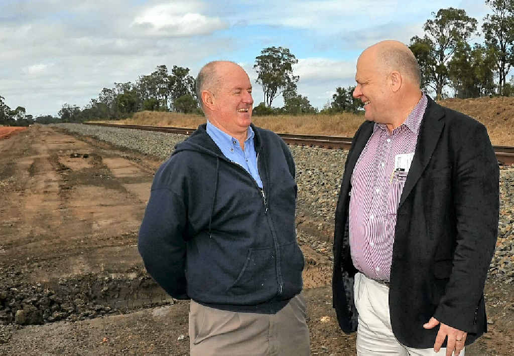 Banana Shire Mayor John Hooper and Origin project manager for pipelines Graeme Hogarth discuss the site of the new rail siding. Banana Shire Mayor John Hooper and Origin project manager for pipelines Graeme Hogarth discuss the site of the new rail siding.
