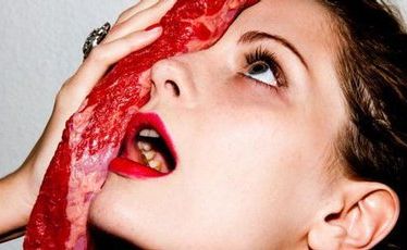 Mischa Barton poses with a slab of raw meat. Mischa Barton poses with a slab of raw meat.