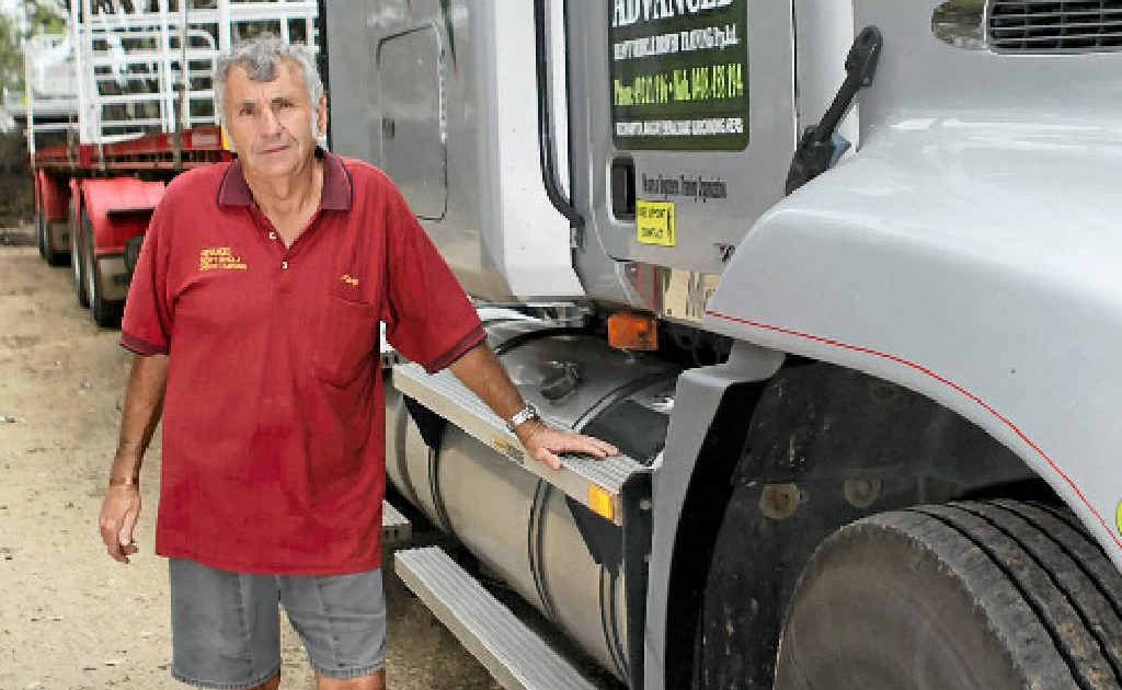 Max Manley stands alongside one of the heavy vehicles he uses for driver training. Max Manley stands alongside one of the heavy vehicles he uses for driver training.